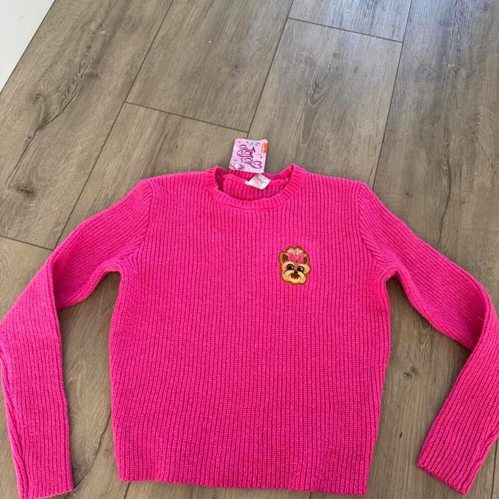 Pink ribbed knit sweater with